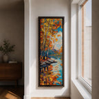 Tall vertical landscape painting of slender birch trees with golden autumn leaves along a calm reflective river. Thick palette knife oil brushstrokes create vibrant fall colors of orange, yellow, and blue with the trees mirrored in the water while distant forest and sky appear softly textured in the background.