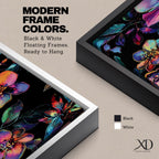 Tall vertical botanical artwork featuring glowing neon flowers in vibrant rainbow colors against a deep black background. Large luminous blossoms in pink, orange, purple, and blue are surrounded by detailed leaves, creating a modern floral composition with bold contrast and iridescent color transitions.