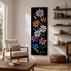 Tall vertical floral artwork featuring colorful daisy flowers in white, orange, purple, pink, and blue rising along slender green stems against a deep black background. The composition highlights bright petals and yellow centers with smooth painterly details and vibrant botanical contrast.
