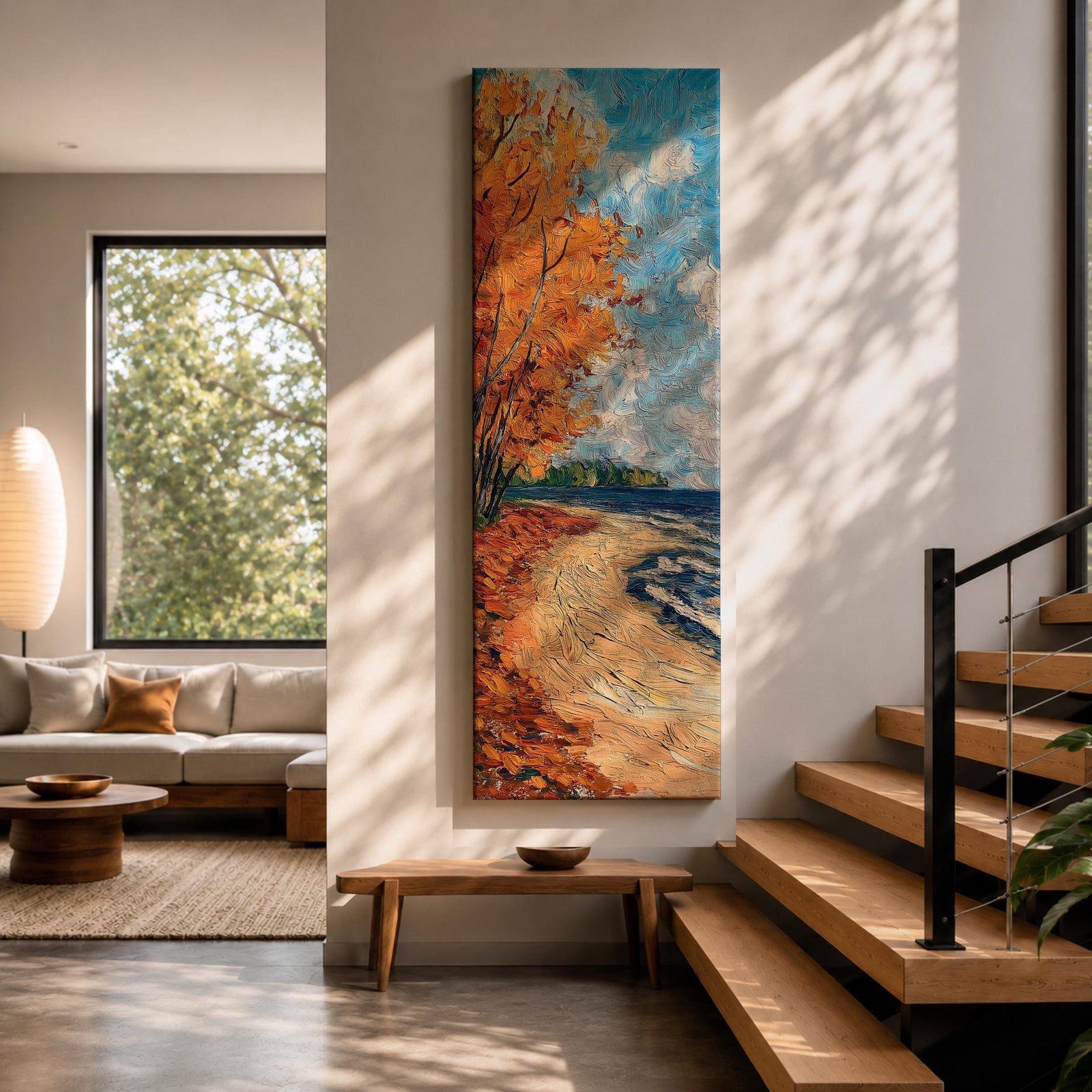 Tall vertical landscape painting of an autumn shoreline with golden orange trees lining a sandy beach beside deep blue water. Thick palette knife brushstrokes create textured waves, falling leaves, and swirling sky patterns while the curved shoreline leads toward a distant forest horizon.