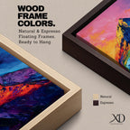 Tall vertical abstract mountain painting with bold colorful peaks in vibrant blue, red, purple, and yellow tones. Thick impasto brushstrokes create dramatic alpine ridges beneath a bright pink and orange sky, forming a modern expressive mountain landscape.