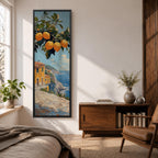 Tall vertical Mediterranean coastal painting showing bright yellow lemons hanging from a leafy branch above an Amalfi seaside village. Colorful Italian buildings sit along a cliffside path overlooking deep blue ocean waters beneath a sunny sky.