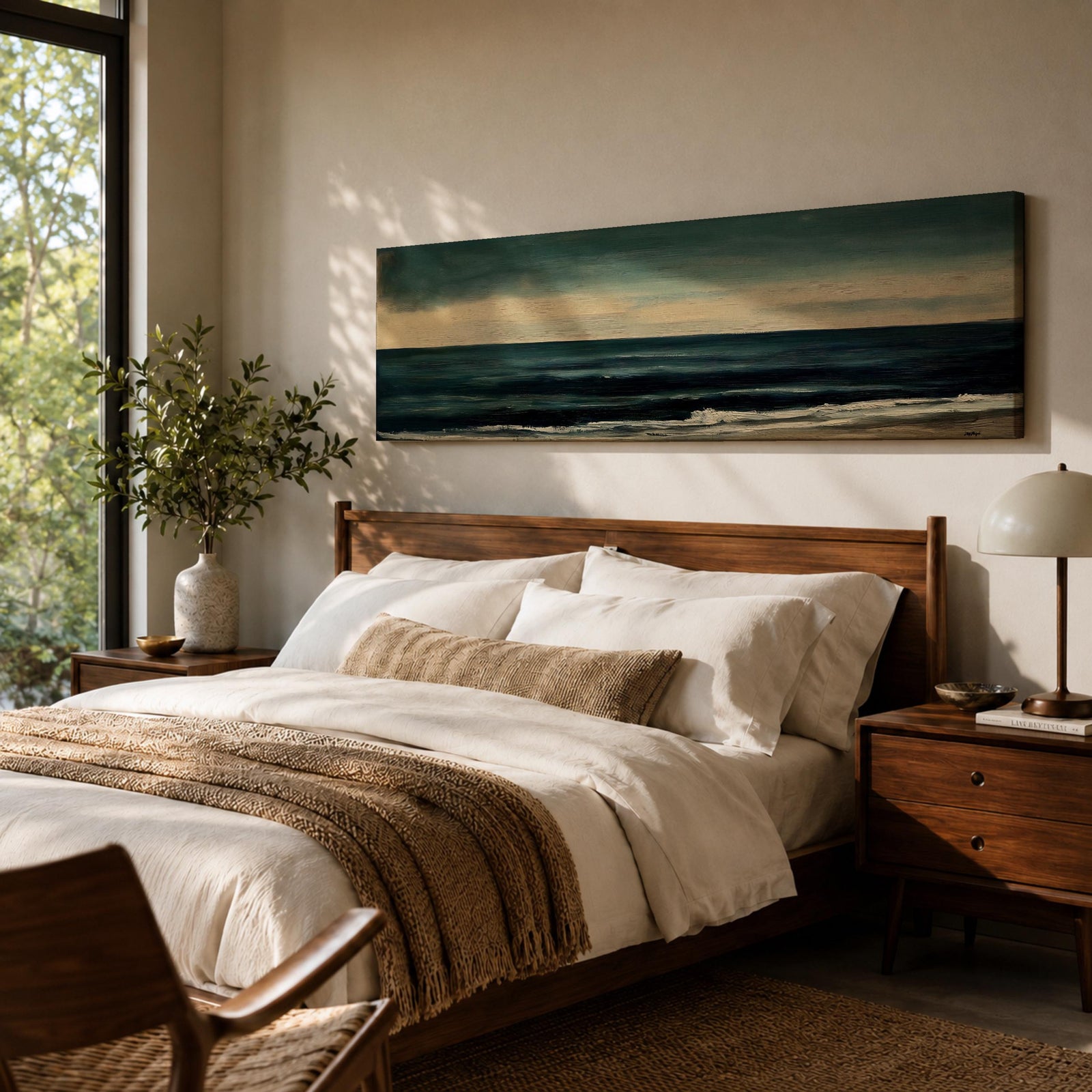 Panoramic seascape painting showing dark rolling waves beneath a dramatic cloudy sky with faint light breaking along the distant horizon. Deep teal and navy tones blend across the water while textured brushstrokes form soft foam along the shoreline, creating a moody minimalist coastal composition across the wide horizontal canvas.