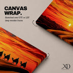 Panoramic desert sunset painting featuring a silhouette caravan of camels and riders walking along rolling sand dunes beneath a glowing red and orange sky. The low sun sits near the horizon while layered desert dunes stretch into the distance, creating a dramatic wide composition across the desert landscape.