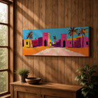 Panoramic desert village painting showing colorful Moroccan kasbah buildings in bright pink and warm ochre tones with tall palm trees lining a sandy road. Bold textured brushstrokes and vibrant colors create a lively North African scene beneath a clear blue sky across the wide horizontal composition.