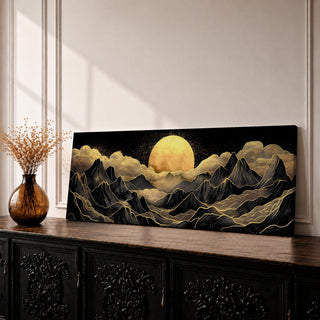 Panoramic moonlit mountain landscape painting featuring layered black mountains outlined with flowing gold lines beneath a glowing full moon. Soft golden clouds drift across a dark sky while ridges and valleys unfold across the wide composition, creating a dramatic celestial scene with textured metallic accents.