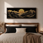 Panoramic moonlit mountain landscape painting featuring layered black mountains outlined with flowing gold lines beneath a glowing full moon. Soft golden clouds drift across a dark sky while ridges and valleys unfold across the wide composition, creating a dramatic celestial scene with textured metallic accents.
