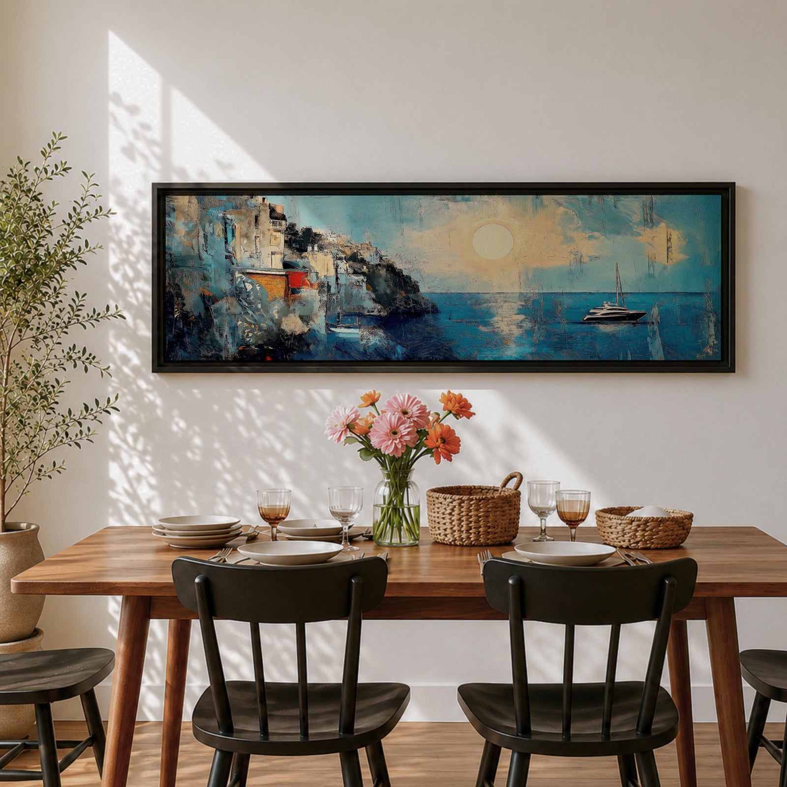 Panoramic Mediterranean coastal painting showing white cliffside houses overlooking deep blue sea at sunset. A sailboat drifts across calm water while sunlight reflects across the horizon and textured brushstrokes form dramatic rocky cliffs and coastal architecture in the wide horizontal seaside composition.