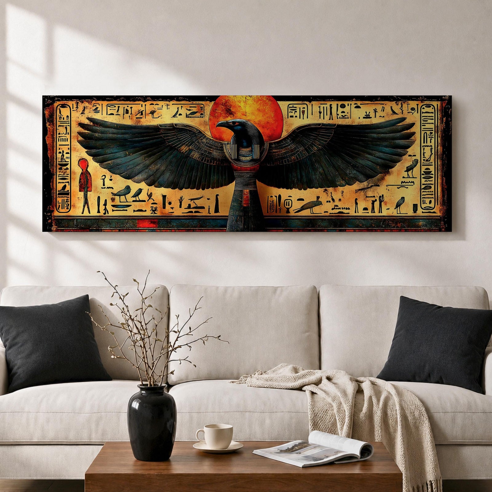 Panoramic ancient Egyptian style artwork featuring the falcon headed god Horus with wide outstretched wings beneath a glowing red sun disk. Hieroglyphic symbols and figures frame the composition while textured gold and dark tones highlight the wings and central deity across the wide symmetrical scene.
