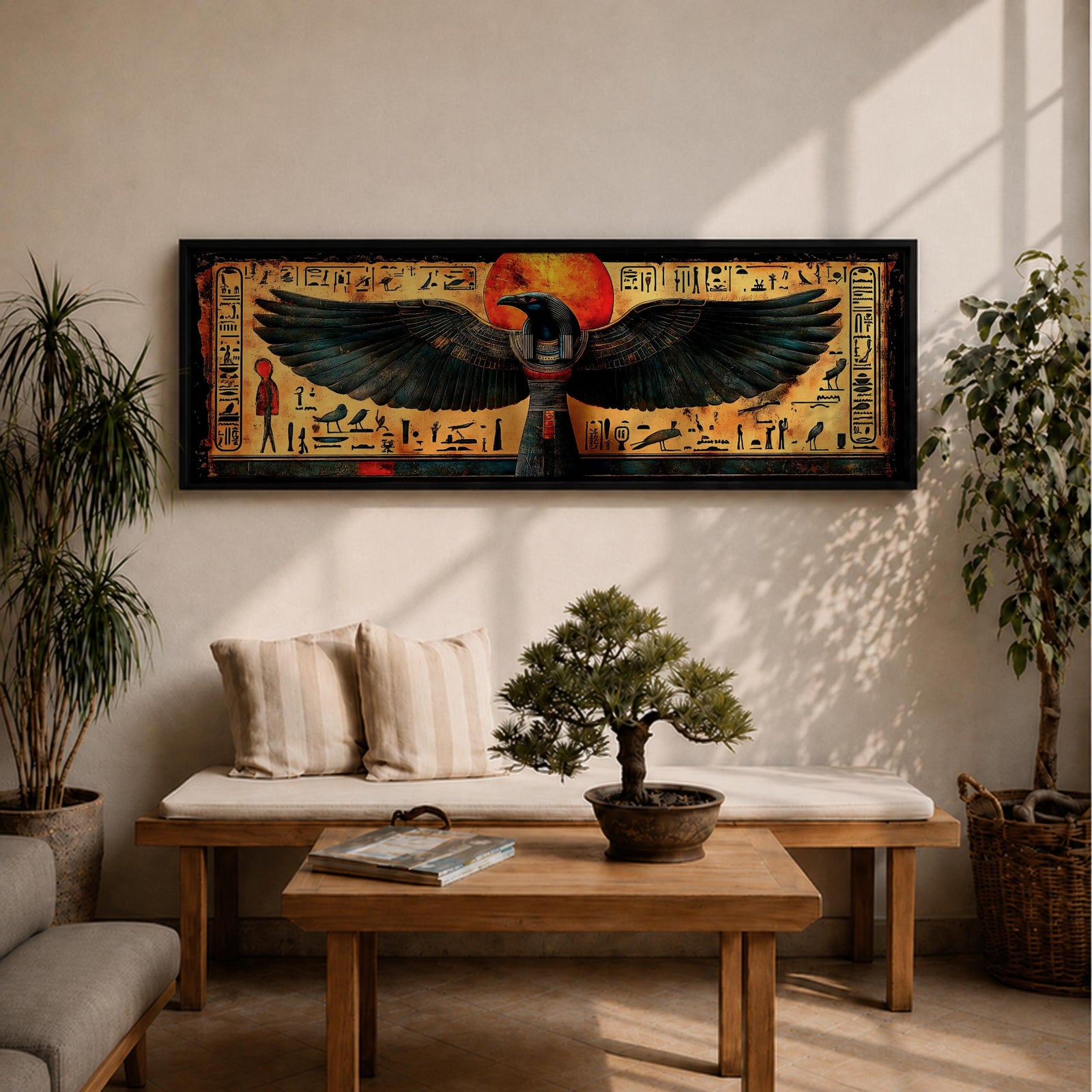 Panoramic ancient Egyptian style artwork featuring the falcon headed god Horus with wide outstretched wings beneath a glowing red sun disk. Hieroglyphic symbols and figures frame the composition while textured gold and dark tones highlight the wings and central deity across the wide symmetrical scene.
