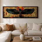 Panoramic ancient Egyptian style artwork featuring the falcon headed god Horus with wide outstretched wings beneath a glowing red sun disk. Hieroglyphic symbols and figures frame the composition while textured gold and dark tones highlight the wings and central deity across the wide symmetrical scene.
