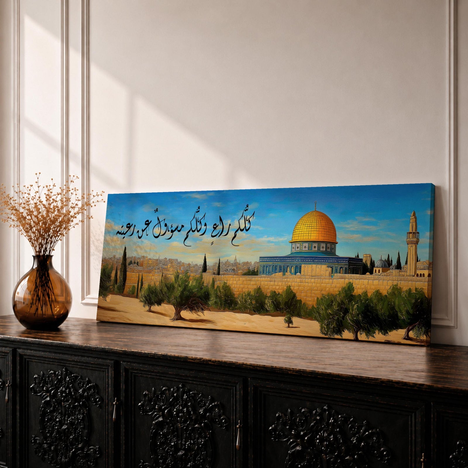 A long narrow panoramic painting depicts Masjid Al Aqsa with its iconic golden dome rising above stone walls and surrounding trees, set against a clear sky with Arabic calligraphy flowing across the upper composition, rendered in a detailed painterly style that blends architectural precision with warm tones and a serene landscape atmosphere.