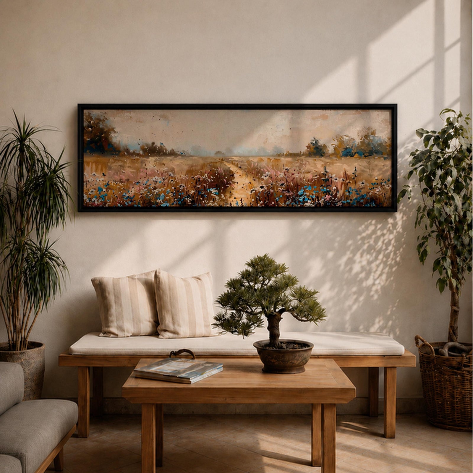 Panoramic wildflower meadow landscape painting featuring a soft rural field filled with scattered blue and white flowers across golden grasses. A narrow path leads through the meadow toward distant trees and open countryside beneath a muted cloudy sky, with textured brushstrokes creating depth across the wide pastoral scene.