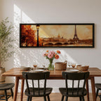 A long panoramic watercolor style painting of the Eiffel Tower rising above the Paris skyline beside the Seine River. Warm autumn foliage frames the scene while a bridge crosses the river and historic buildings sit beneath a glowing sky, creating a romantic Paris cityscape in a wide horizontal composition.