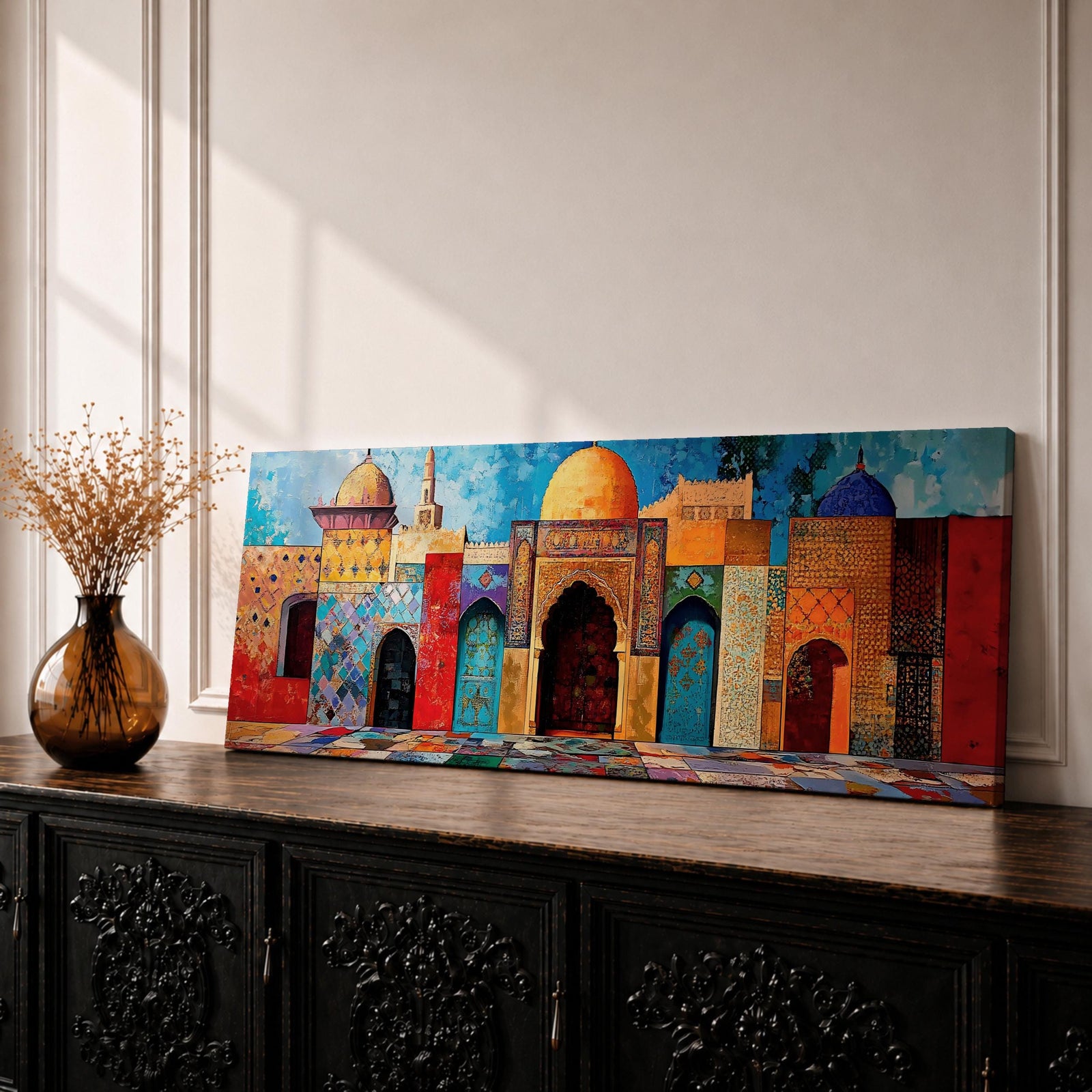Panoramic painting of colorful Islamic architecture featuring ornate Moroccan and Moorish arches, tiled walls, and domed rooftops arranged in a vibrant row. Intricate geometric patterns and mosaic textures in reds, blues, and golds decorate the buildings beneath a bright sky across the wide composition.