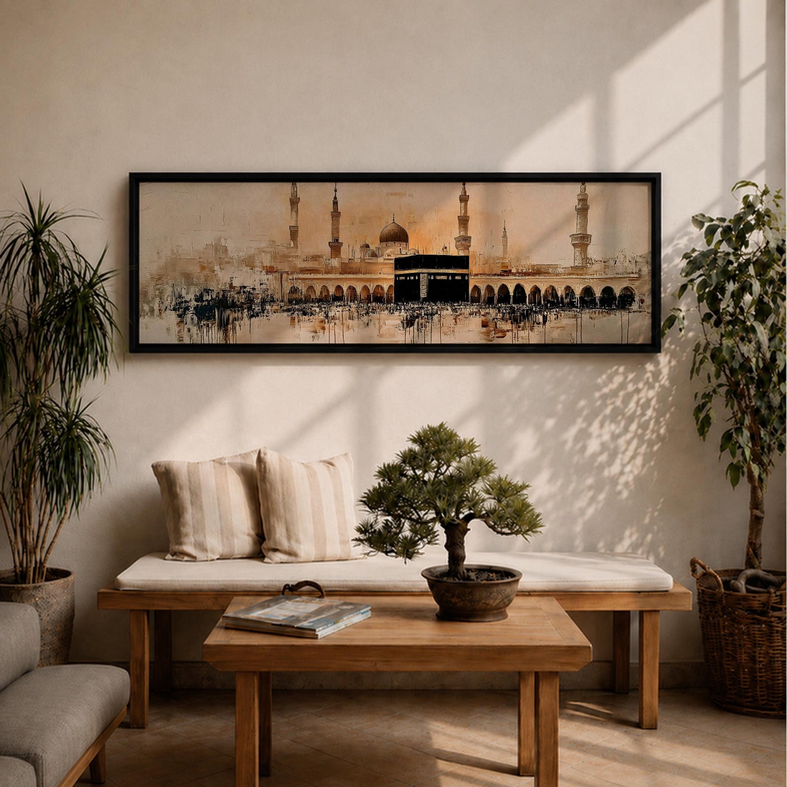 Panoramic painting of the Kaaba at Masjid Al Haram in Mecca surrounded by mosque arches and tall minarets. The sacred black cube stands at the center of a wide courtyard with crowds gathered around while warm golden tones and architectural details stretch across the expansive skyline.