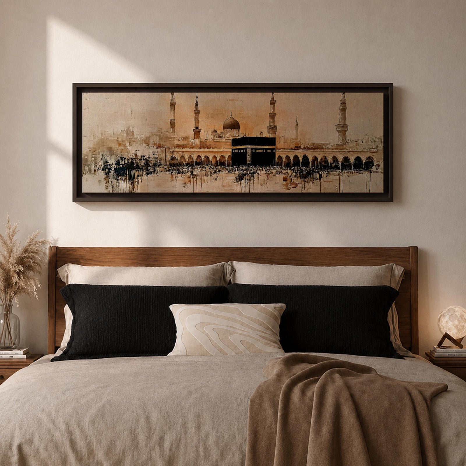Panoramic painting of the Kaaba at Masjid Al Haram in Mecca surrounded by mosque arches and tall minarets. The sacred black cube stands at the center of a wide courtyard with crowds gathered around while warm golden tones and architectural details stretch across the expansive skyline.