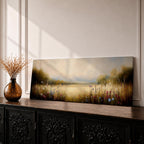 Panoramic meadow landscape painting showing soft golden grasses and delicate wildflowers across an open countryside field with distant trees and a glowing sky creating a peaceful prairie scene.