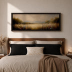 Panoramic meadow landscape painting showing soft golden grasses and delicate wildflowers across an open countryside field with distant trees and a glowing sky creating a peaceful prairie scene.