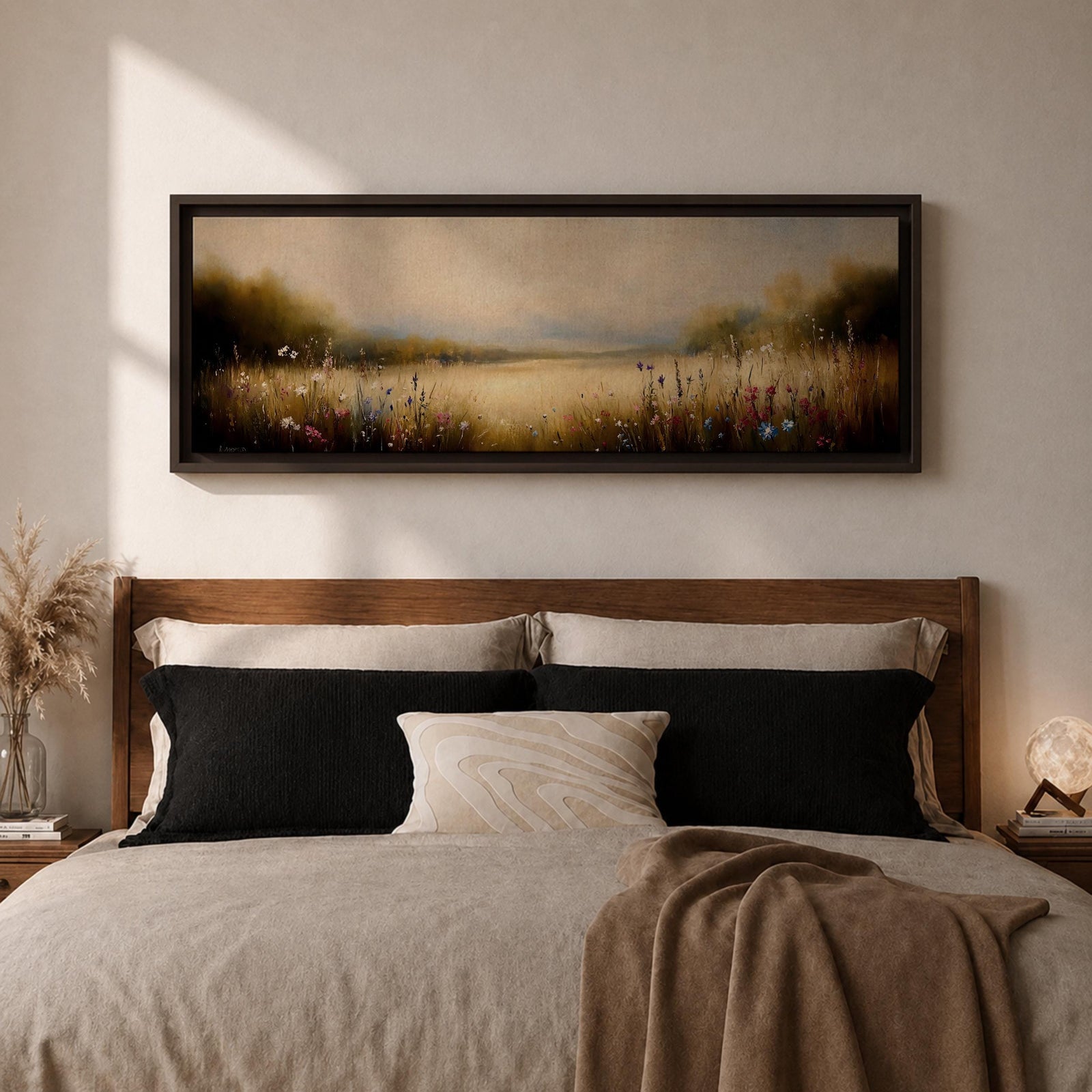 Panoramic meadow landscape painting showing soft golden grasses and delicate wildflowers across an open countryside field with distant trees and a glowing sky creating a peaceful prairie scene.