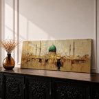 Panoramic Islamic wall art featuring Masjid Al Nabawi in Medina with the iconic green dome and mosque minarets rendered in a warm textured abstract cityscape style.