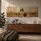 Panoramic Islamic wall art featuring Masjid Al Nabawi in Medina with the iconic green dome and mosque minarets rendered in a warm textured abstract cityscape style.
