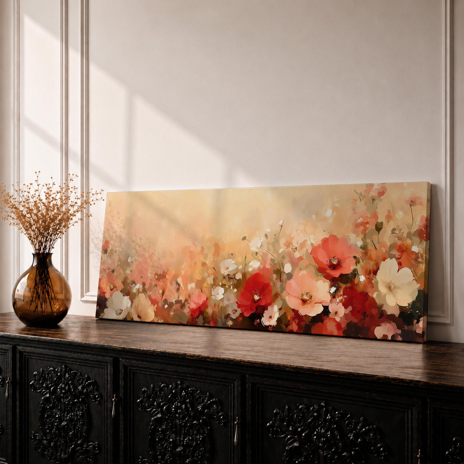 Panoramic painting of a blooming wildflower field featuring soft blush, red, coral, and cream flowers scattered across a warm neutral background. The composition stretches horizontally with loose impressionistic brushstrokes and layered petals, creating a flowing meadow of abstract floral forms with soft color transitions and textured botanical elements.