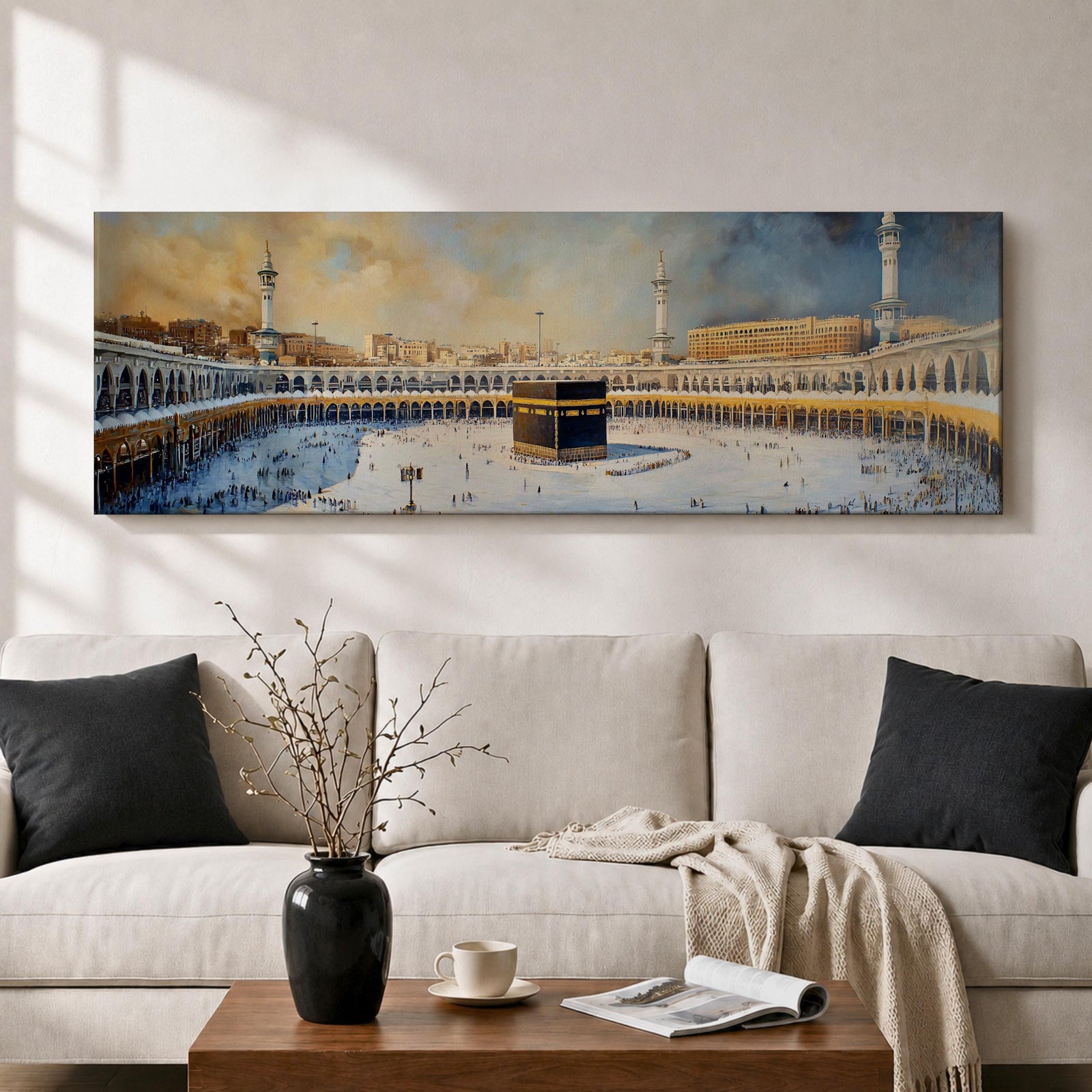 Panoramic Islamic wall art showing the Kaaba at Masjid Al Haram in Mecca surrounded by mosque arches, minarets, and pilgrims in a wide sacred courtyard scene.
