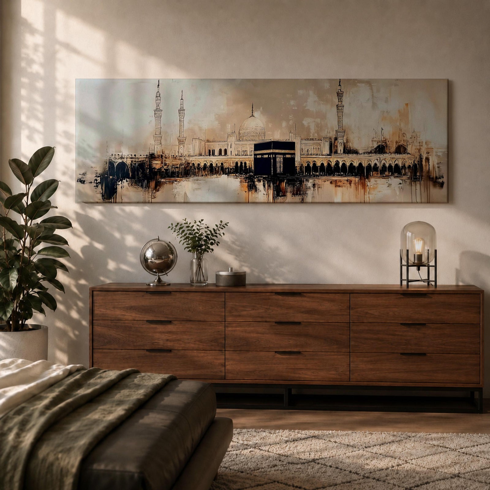 Panoramic painting of the Kaaba at Masjid al Haram with surrounding mosque arches and minarets, rendered in a loose abstract style with warm beige, brown, and black tones. The composition stretches horizontally with expressive brush textures, architectural silhouettes, and layered strokes highlighting the Kaaba at the center of the sacred mosque complex.