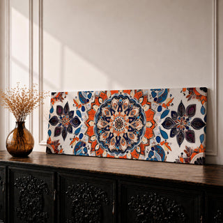 Panoramic artwork displaying an intricate Islamic mandala composed of symmetrical Moorish geometric and floral motifs radiating from a central rosette, featuring layered arabesque shapes and zellige inspired tile patterns in orange, blue, cream, and dark accents arranged in a balanced ornamental composition.