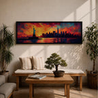 Panoramic cityscape painting showing the Statue of Liberty standing in the harbor with the New York City skyline stretching across the horizon, including tall skyscrapers and One World Trade Center, illuminated by a dramatic sunset sky filled with vibrant red, orange, and blue clouds reflected in the water.