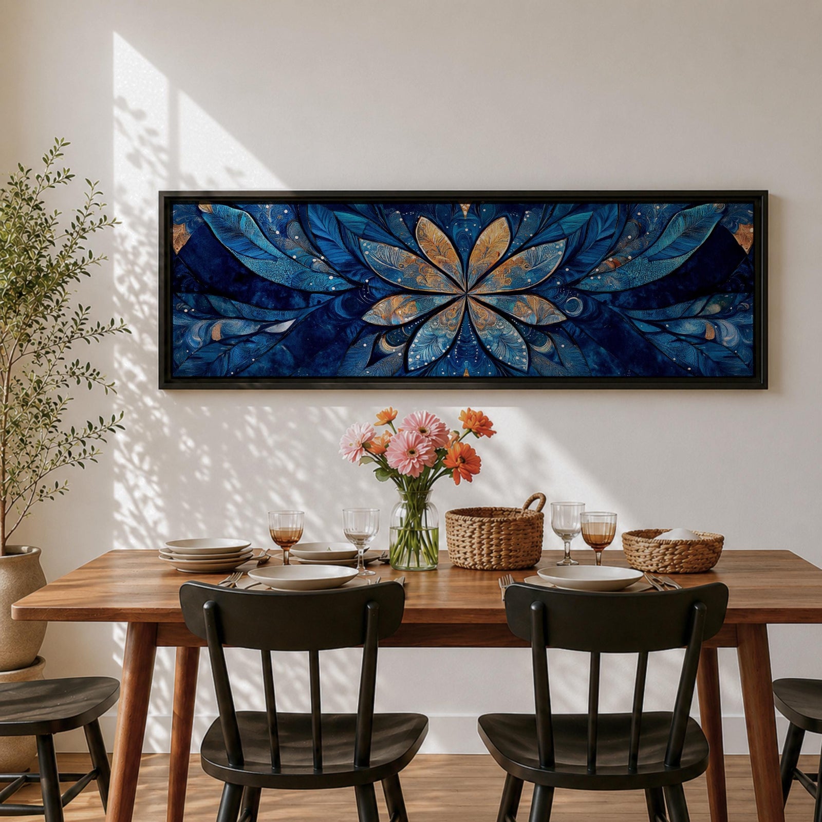 Panoramic floral mandala artwork featuring a symmetrical lotus flower design with layered petals spreading outward in deep blue and gold tones, accented with delicate botanical shapes and watercolor textures that create an intricate ornamental pattern across a wide horizontal composition.