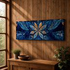 Panoramic floral mandala artwork featuring a symmetrical lotus flower design with layered petals spreading outward in deep blue and gold tones, accented with delicate botanical shapes and watercolor textures that create an intricate ornamental pattern across a wide horizontal composition.