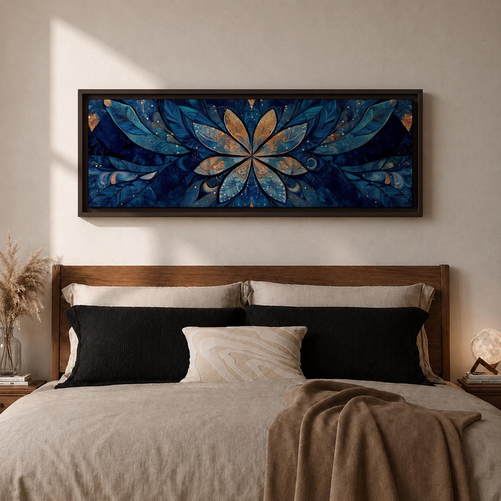 Panoramic floral mandala artwork featuring a symmetrical lotus flower design with layered petals spreading outward in deep blue and gold tones, accented with delicate botanical shapes and watercolor textures that create an intricate ornamental pattern across a wide horizontal composition.