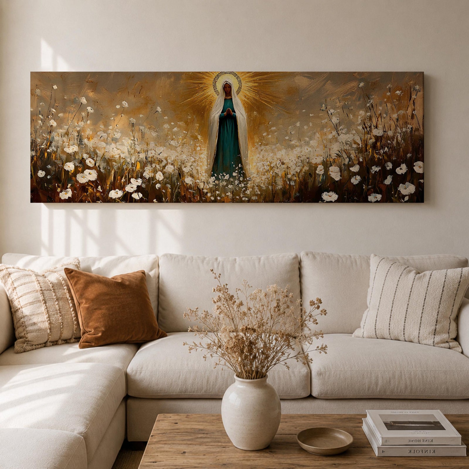 Panoramic religious painting depicting the Virgin Mary standing in a glowing field of white flowers with hands gently clasped in prayer, wearing a flowing robe and veil illuminated by radiant golden light forming a halo behind her, surrounded by soft natural scenery rendered in warm earthy tones and expressive brushstrokes.