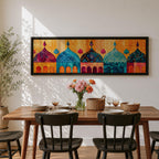 Panoramic artwork depicting a row of colorful Islamic mosque domes and arches rendered in vibrant watercolor style, featuring intricate geometric patterns and ornamental details in shades of turquoise, orange, pink, and gold forming a stylized architectural skyline inspired by Middle Eastern and Arabic design.