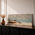 Panoramic oil painting of a weathered wooden rowboat resting on a sandy beach with a single oar lying beside it, facing calm ocean water and a distant horizon beneath a textured cloudy sky rendered in muted coastal tones with soft waves and subtle shoreline detail.