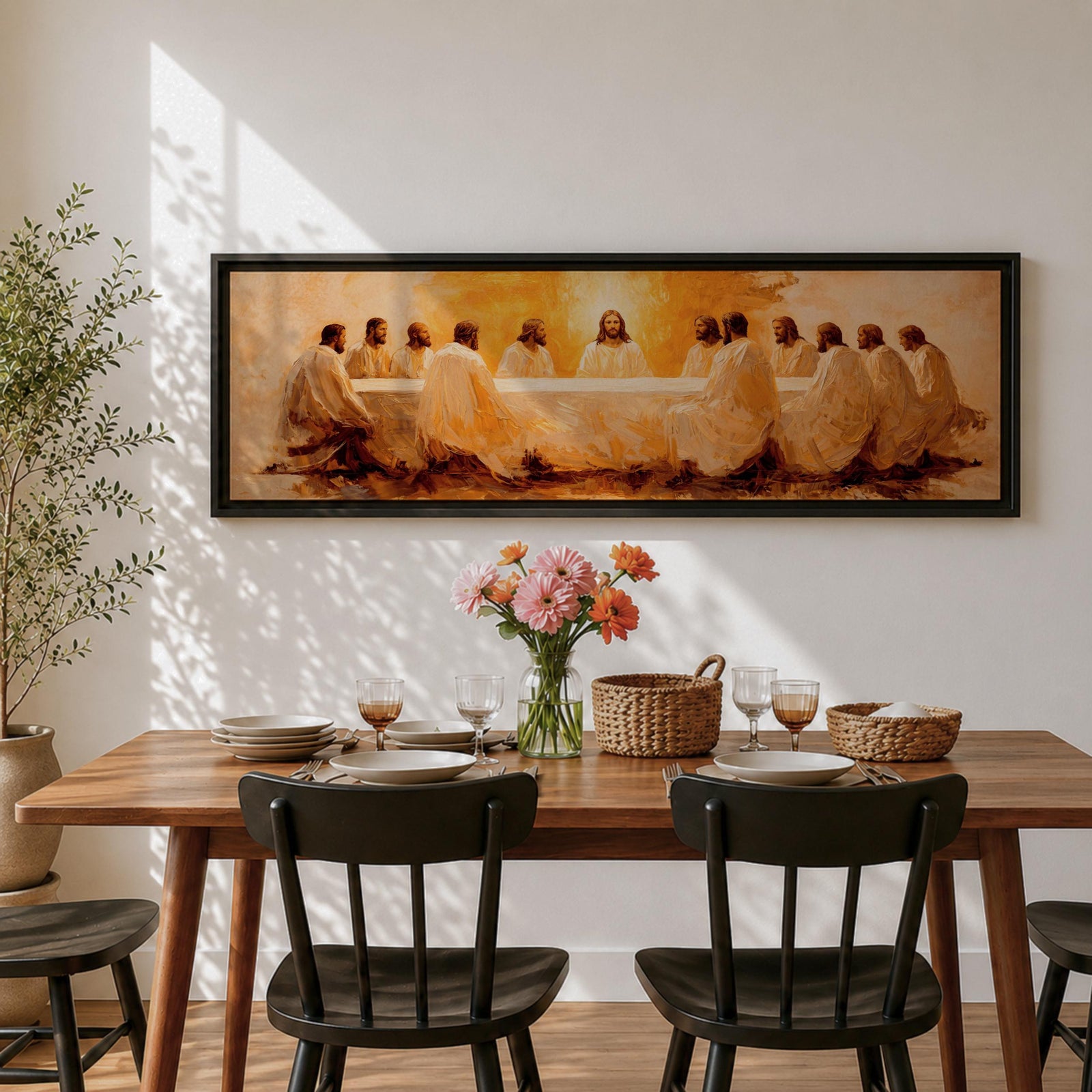 Panoramic religious painting depicting Jesus and the twelve disciples gathered around the Last Supper table illuminated by warm golden light, creating a sacred Christian biblical scene.