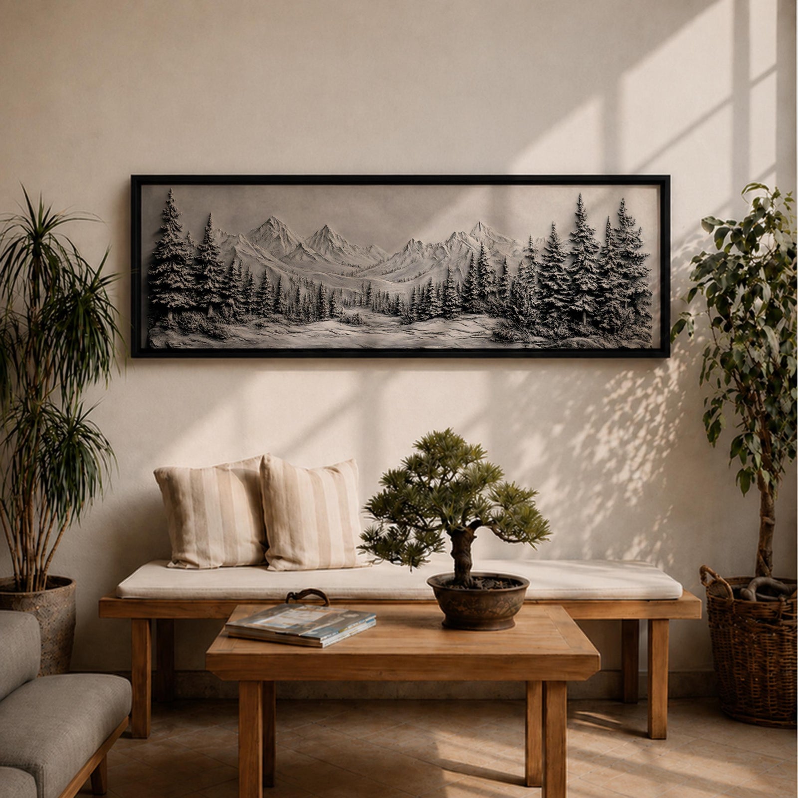 Panoramic monochrome landscape artwork depicting snow covered mountains and a dense pine forest with a winter valley scene rendered in black and white tones.