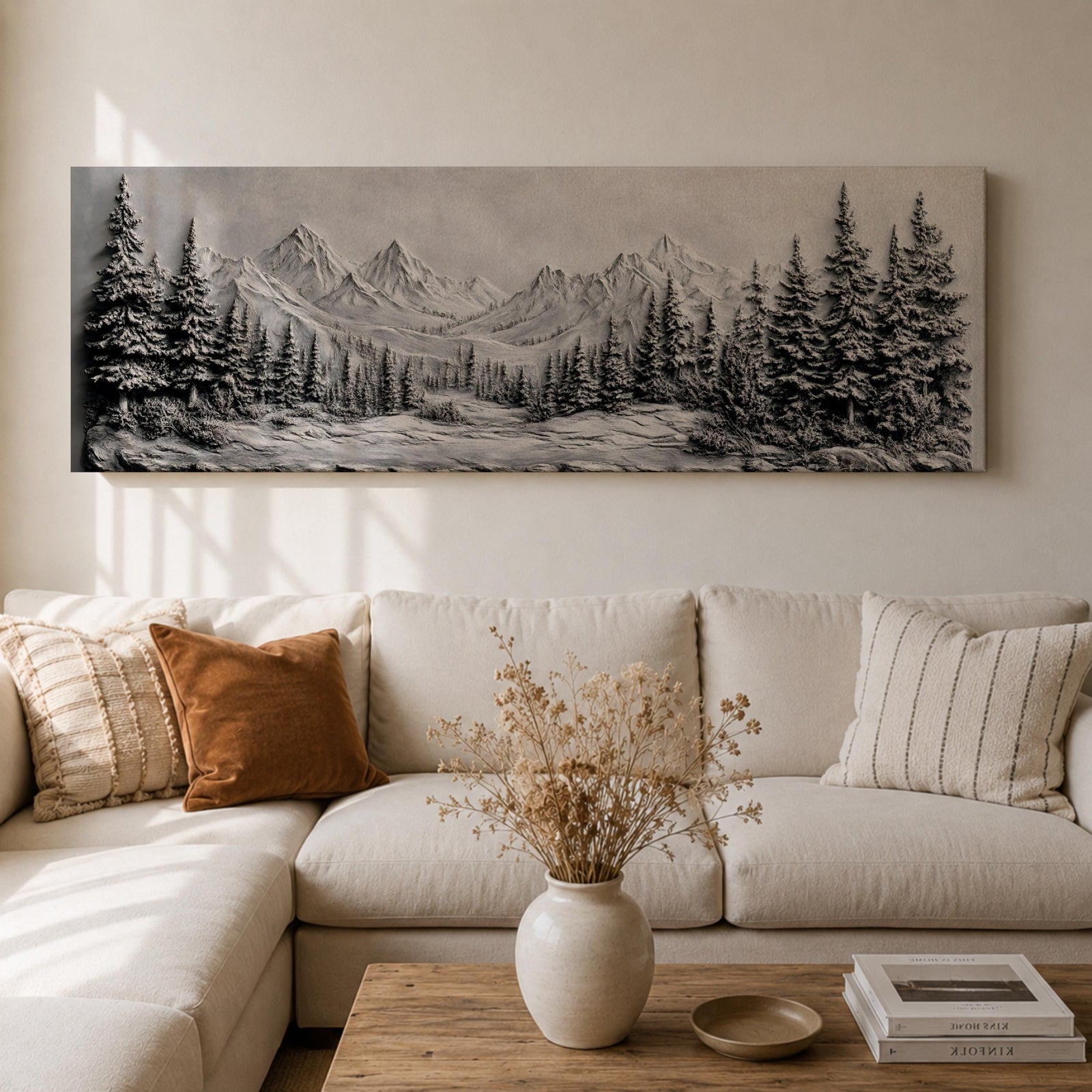 Panoramic monochrome landscape artwork depicting snow covered mountains and a dense pine forest with a winter valley scene rendered in black and white tones.