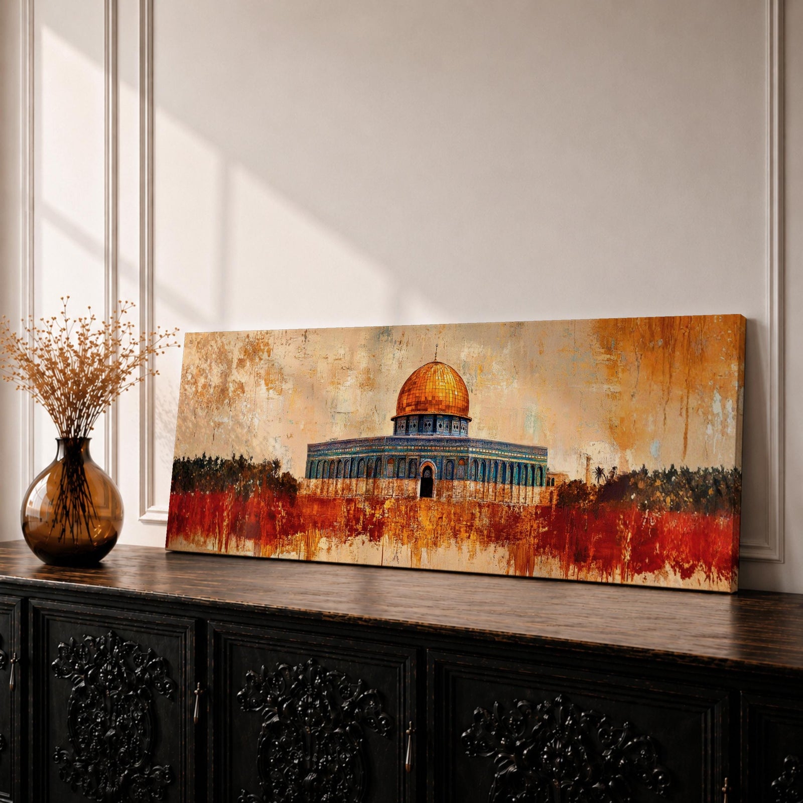 A panoramic abstract painting of the Dome of the Rock with its golden dome rising above the historic structure, rendered in textured brushstrokes with warm ochre, rust, and gold tones blending into a distressed background while dark silhouettes of trees and landscape stretch across the horizontal composition.