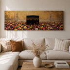 A panoramic painting of the Kaaba standing at the center of a vibrant field of colorful flowers with red, pink, yellow, and white blossoms stretching across the foreground, set against a glowing gold textured background with faint mosque silhouettes and minarets surrounding the sacred structure.