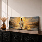 A panoramic painting of Jesus walking across the surface of the sea beneath a glowing golden sunset, his flowing white robes illuminated by radiant light as waves ripple around his feet while distant mountains and dramatic clouds frame the horizon.
