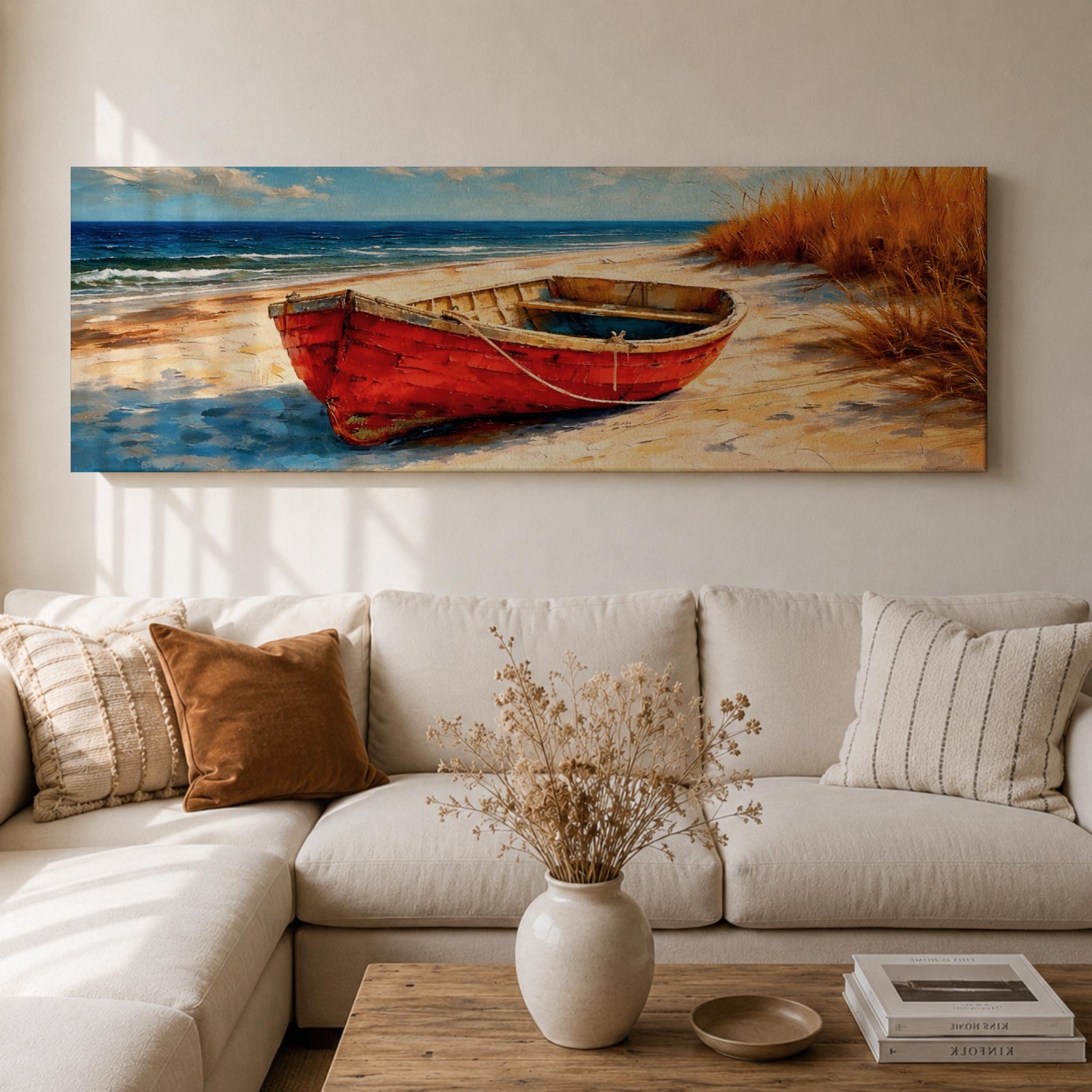 Panoramic coastal painting of a weathered red wooden boat resting on a sandy beach beside tall golden dune grass with the blue ocean and gentle waves in the background.