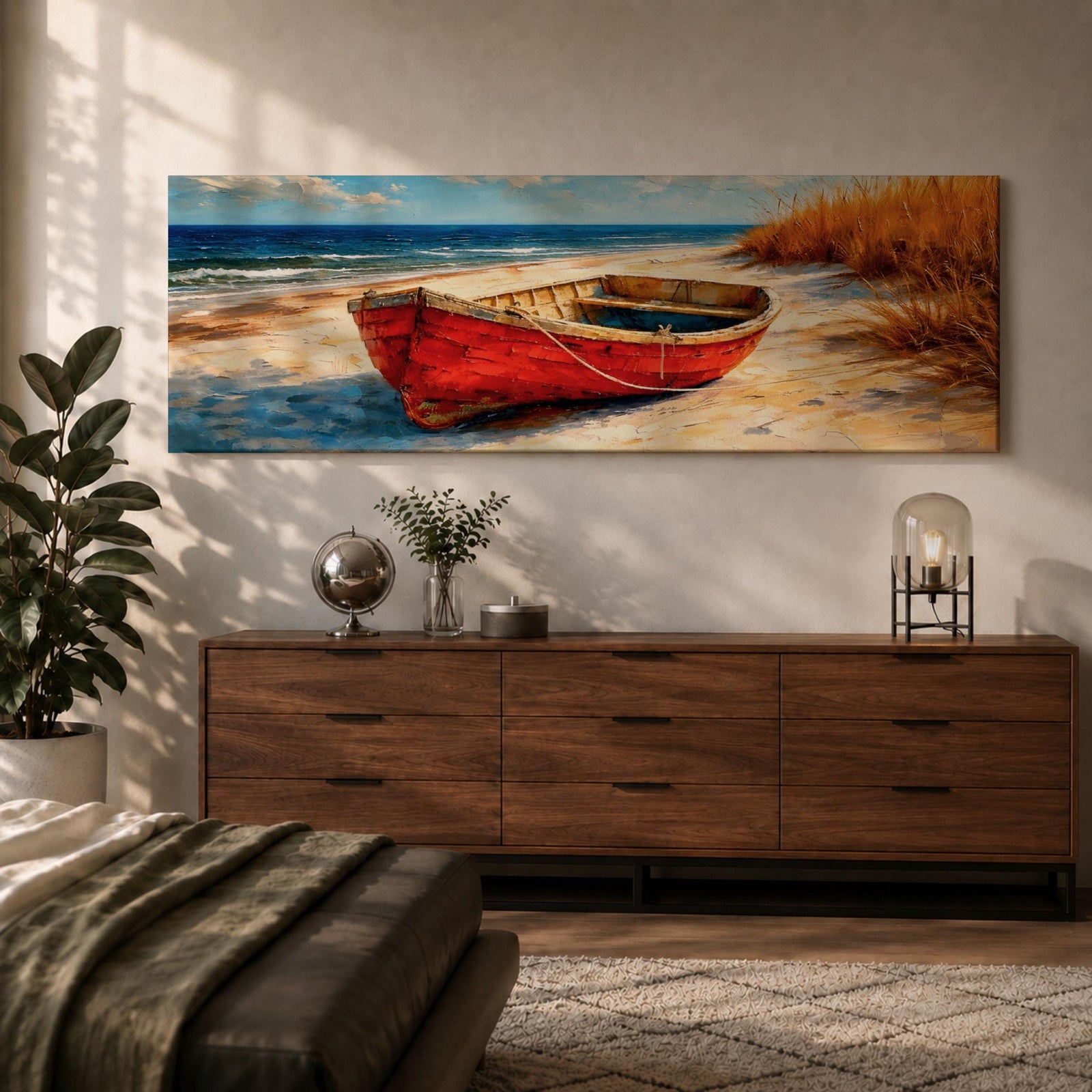 Panoramic coastal painting of a weathered red wooden boat resting on a sandy beach beside tall golden dune grass with the blue ocean and gentle waves in the background.