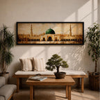 A long panoramic painting of the Prophet’s Mosque in Medina featuring the iconic green dome centered above grand archways and courtyards. Tall minarets rise on both sides while warm golden tones and textured brush strokes depict the historic Islamic mosque complex in a wide horizontal architectural composition.
