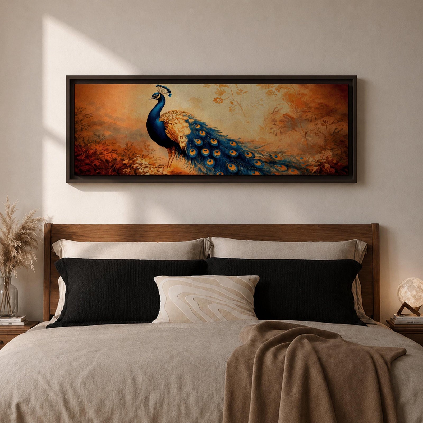 A long panoramic painting of a vibrant peacock standing in an autumn landscape with its long blue and gold tail feathers flowing across the composition. The bird displays detailed eye patterned plumage while warm sunset tones and delicate foliage create a serene nature scene in a wide horizontal format.