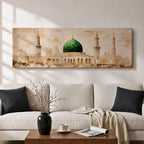 A long panoramic painting of the Green Dome of Masjid Nabawi in Medina rising above elegant mosque arches and courtyards. Tall slender minarets frame the sacred structure while soft beige and golden tones create a historic Islamic architectural scene centered on the iconic green dome in a wide horizontal composition.
