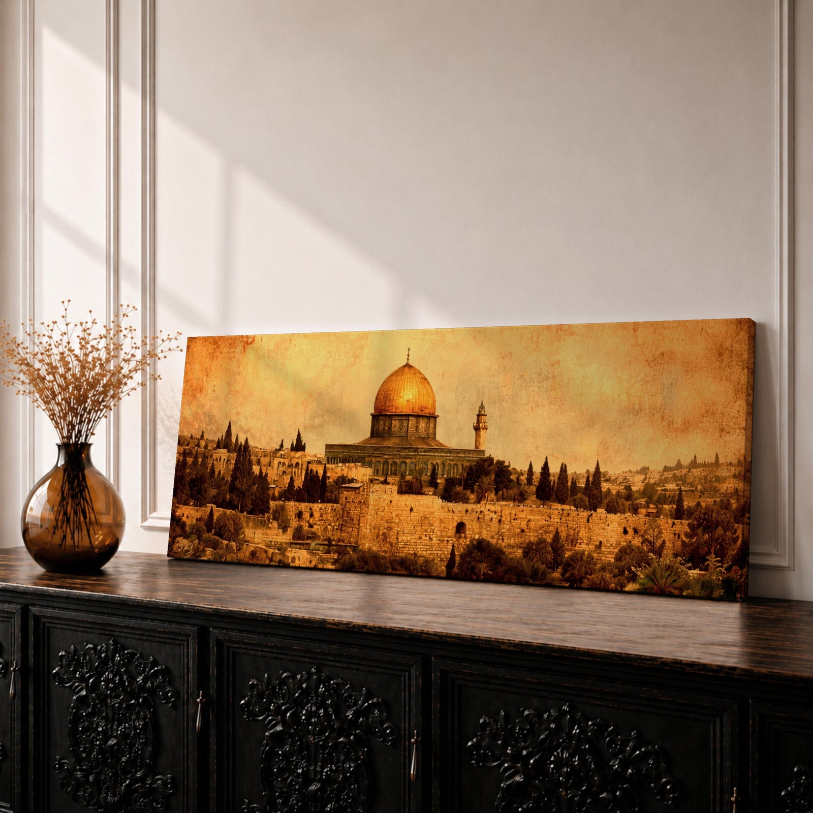 A long panoramic artwork depicting the Dome of the Rock in Jerusalem with its golden dome rising above ancient stone walls and historic buildings. Cypress trees and old city structures surround the shrine while warm sepia tones and textured sky create a vintage Middle Eastern cityscape in a wide horizontal composition.