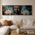 A long panoramic painting featuring a serene Buddha face with closed eyes centered between two blooming white lotus flowers. Rich textured tones of teal, black and gold surround the figure while the lotus blossoms frame the composition, creating a calm meditative Buddhist scene across a wide horizontal canvas.